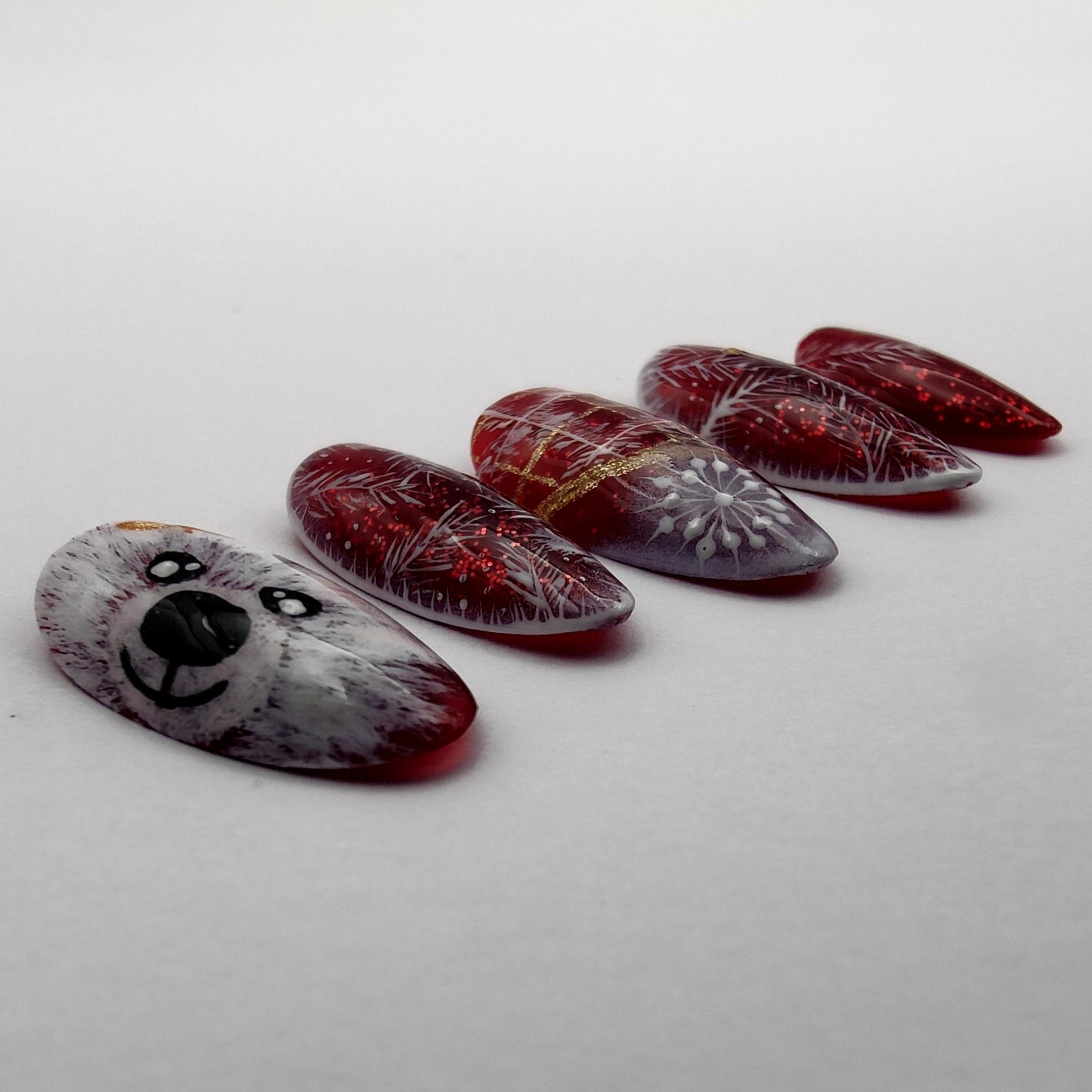 Ours de Noël Déa Manus