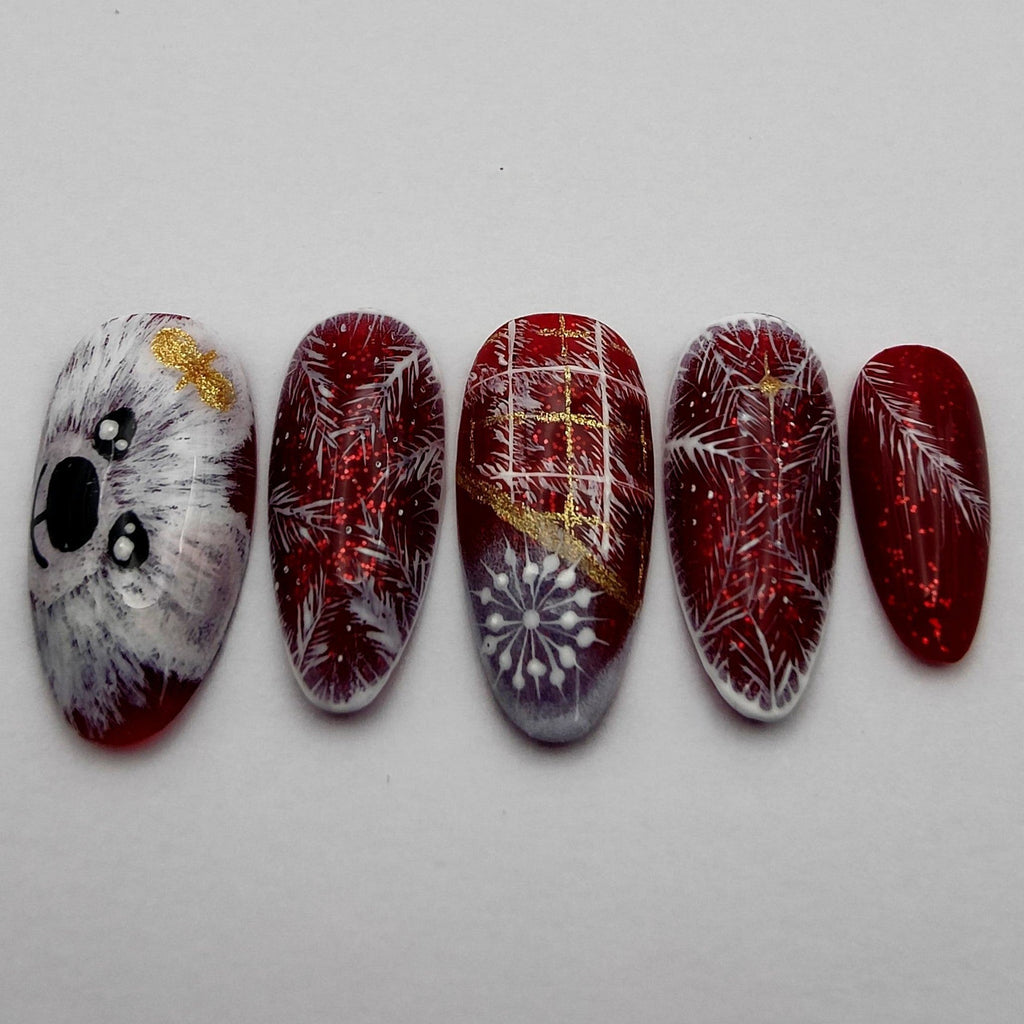 Ours de Noël Déa Manus